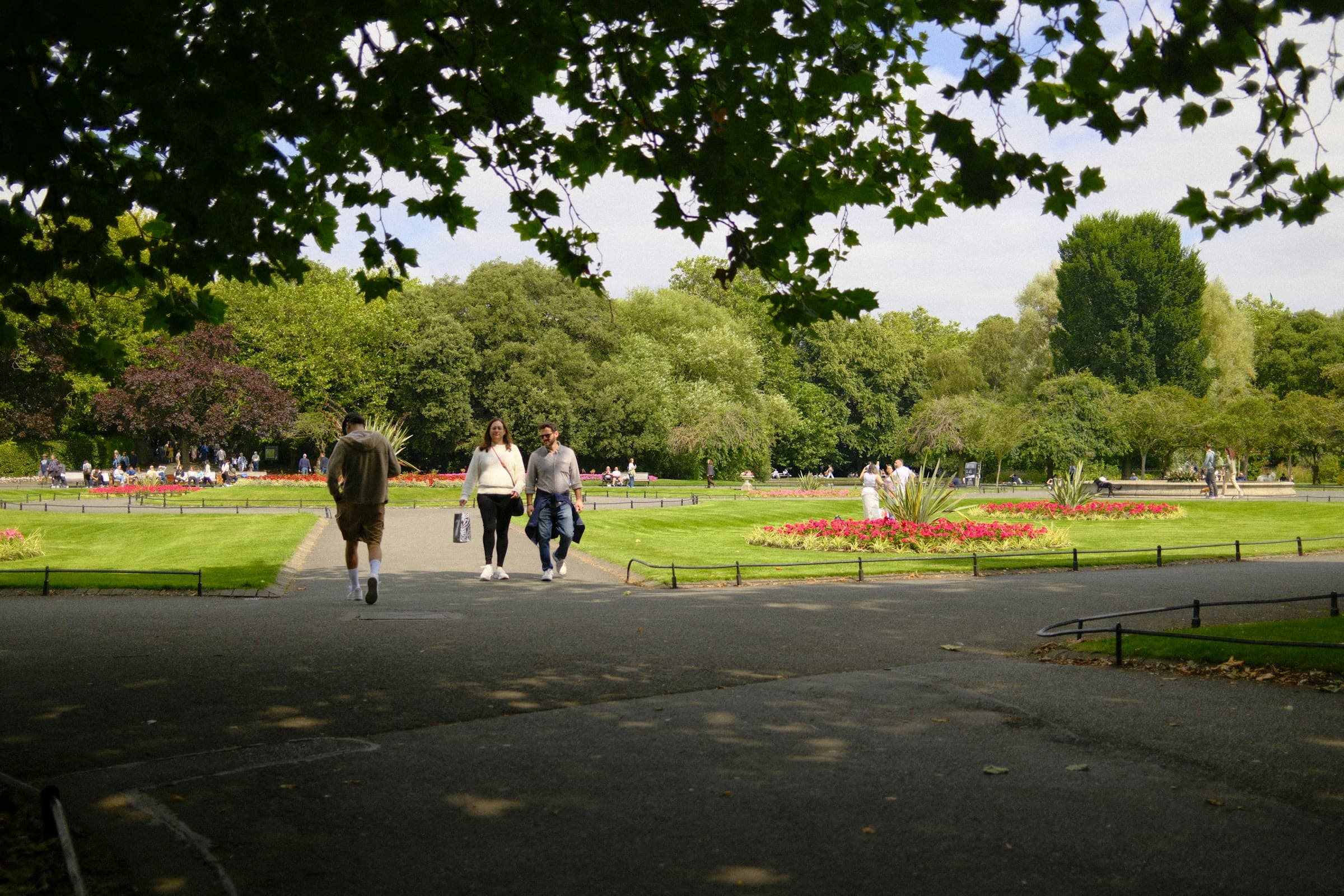 People walking through a park in Dublin